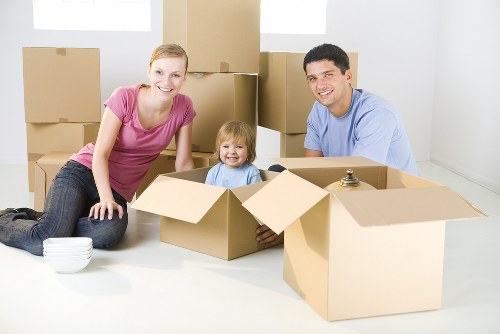 Removal team planning a house move in Sutton on a residential street