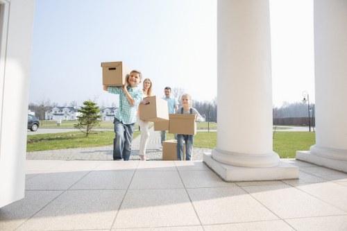Packed student belongings and furniture ready for collection in Sutton