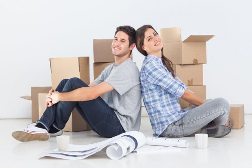 Local moving van loading furniture in Sutton