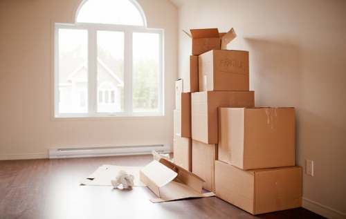 Professional movers handling sofa and wardrobe transport locally