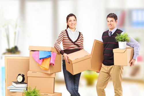 Packed office equipment ready for relocation in Sutton